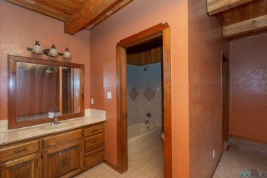 Welcome home! This charming 3-bedroom, 2-bath home is full of on Roswell Country Club in New Mexico - for sale on GolfHomes.com, golf home, golf lot