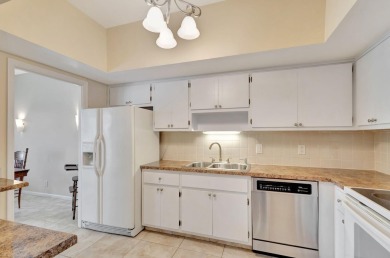 SPACIOUS ONE BEDROOM CONDO OVERLOOKING THE COURTYARD WITH ONE on BallenIsles Golf and Country Club in Florida - for sale on GolfHomes.com, golf home, golf lot