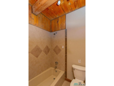 Welcome home! This charming 3-bedroom, 2-bath home is full of on Roswell Country Club in New Mexico - for sale on GolfHomes.com, golf home, golf lot