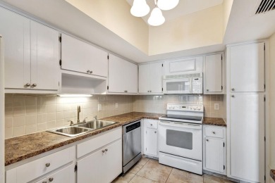 SPACIOUS ONE BEDROOM CONDO OVERLOOKING THE COURTYARD WITH ONE on BallenIsles Golf and Country Club in Florida - for sale on GolfHomes.com, golf home, golf lot