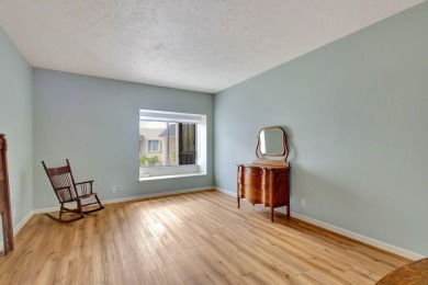 SPACIOUS ONE BEDROOM CONDO OVERLOOKING THE COURTYARD WITH ONE on BallenIsles Golf and Country Club in Florida - for sale on GolfHomes.com, golf home, golf lot