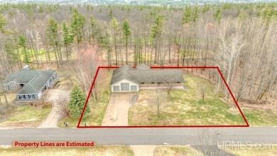Custom-built home on the 16th green of top-rated Timberstone on TimberStone At Pine Mountain in Michigan - for sale on GolfHomes.com, golf home, golf lot
