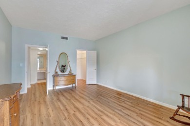 SPACIOUS ONE BEDROOM CONDO OVERLOOKING THE COURTYARD WITH ONE on BallenIsles Golf and Country Club in Florida - for sale on GolfHomes.com, golf home, golf lot