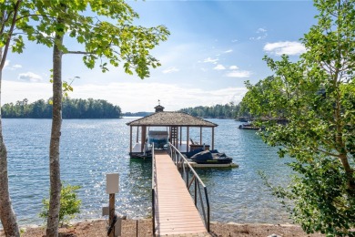 Defining lakeside luxury, this custom-built residence on one of on The Reserve At Lake Keowee in South Carolina - for sale on GolfHomes.com, golf home, golf lot
