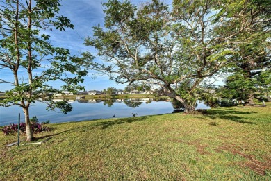 One or more photo(s) has been virtually staged. This home has on Jacaranda West Country Club in Florida - for sale on GolfHomes.com, golf home, golf lot