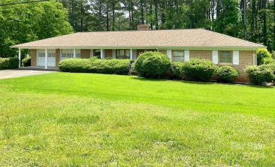 Attractive ranch with handicap accessible features including one for sale on GolfHomes.com