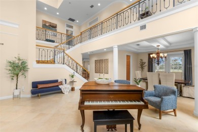 Welcome to this exquisite former model home custom built by on Bayou Golf Club in Florida - for sale on GolfHomes.com, golf home, golf lot
