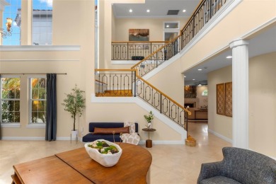 Welcome to this exquisite former model home custom built by on Bayou Golf Club in Florida - for sale on GolfHomes.com, golf home, golf lot