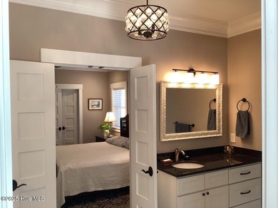 Contemporary tidal home built in 2020. Move-in-ready! Only home on Cypress Landing Golf Club in North Carolina - for sale on GolfHomes.com, golf home, golf lot