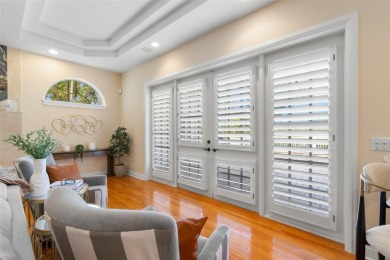 Welcome to this exquisite former model home custom built by on Bayou Golf Club in Florida - for sale on GolfHomes.com, golf home, golf lot