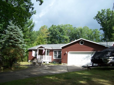 Double Lot, Year round home on private, wooded setting. Located on Burning Oak Country Club in Michigan - for sale on GolfHomes.com, golf home, golf lot