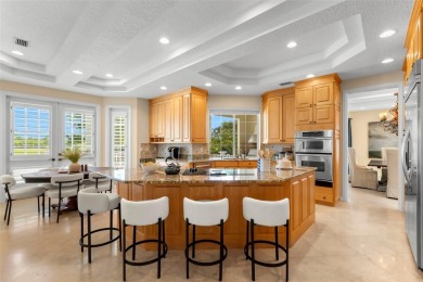 Welcome to this exquisite former model home custom built by on Bayou Golf Club in Florida - for sale on GolfHomes.com, golf home, golf lot