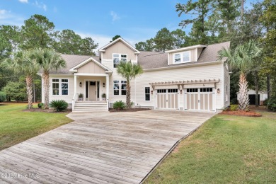 Discover extraordinary craftsmanship in this custom home on the on Magnolia Greens Golf Plantation in North Carolina - for sale on GolfHomes.com, golf home, golf lot