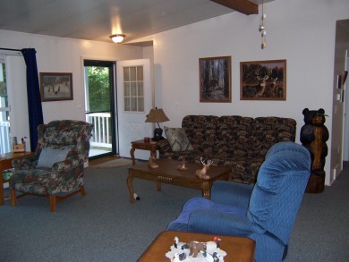 Double Lot, Year round home on private, wooded setting. Located on Burning Oak Country Club in Michigan - for sale on GolfHomes.com, golf home, golf lot