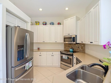 Gorgeous, furnished 2-bedroom, 2 bath home features a flex room on Glen Lakes Country Club in Florida - for sale on GolfHomes.com, golf home, golf lot