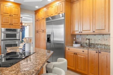 Welcome to this exquisite former model home custom built by on Bayou Golf Club in Florida - for sale on GolfHomes.com, golf home, golf lot