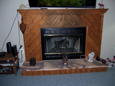 Double Lot, Year round home on private, wooded setting. Located on Burning Oak Country Club in Michigan - for sale on GolfHomes.com, golf home, golf lot
