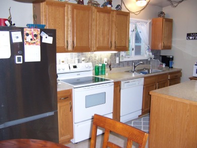 Double Lot, Year round home on private, wooded setting. Located on Burning Oak Country Club in Michigan - for sale on GolfHomes.com, golf home, golf lot