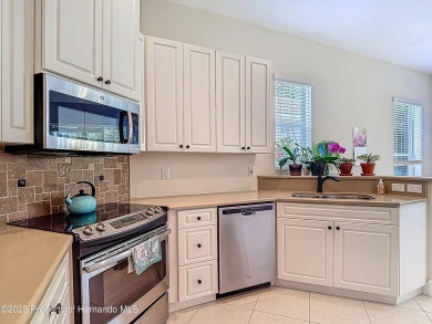 Gorgeous, furnished 2-bedroom, 2 bath home features a flex room on Glen Lakes Country Club in Florida - for sale on GolfHomes.com, golf home, golf lot