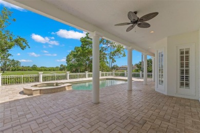 Welcome to this exquisite former model home custom built by on Bayou Golf Club in Florida - for sale on GolfHomes.com, golf home, golf lot