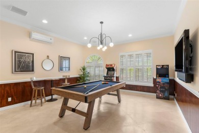 Welcome to this exquisite former model home custom built by on Bayou Golf Club in Florida - for sale on GolfHomes.com, golf home, golf lot