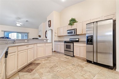 Welcome to this beautifully maintained 3-bedroom, 2-bath home on Desert Lakes Golf Course in Arizona - for sale on GolfHomes.com, golf home, golf lot