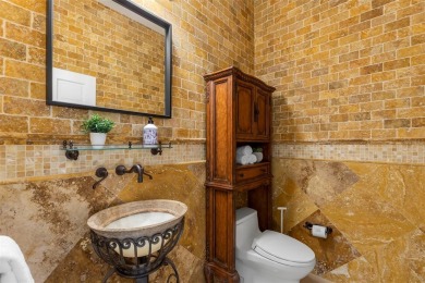 Welcome to this exquisite former model home custom built by on Bayou Golf Club in Florida - for sale on GolfHomes.com, golf home, golf lot