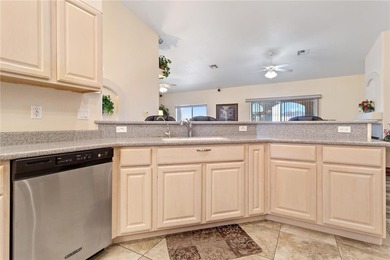 Welcome to this beautifully maintained 3-bedroom, 2-bath home on Desert Lakes Golf Course in Arizona - for sale on GolfHomes.com, golf home, golf lot