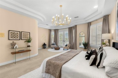 Welcome to this exquisite former model home custom built by on Bayou Golf Club in Florida - for sale on GolfHomes.com, golf home, golf lot