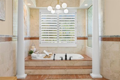 Welcome to this exquisite former model home custom built by on Bayou Golf Club in Florida - for sale on GolfHomes.com, golf home, golf lot