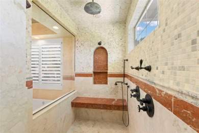 Welcome to this exquisite former model home custom built by on Bayou Golf Club in Florida - for sale on GolfHomes.com, golf home, golf lot
