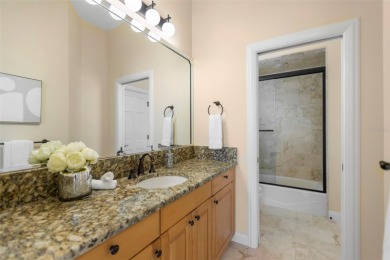 Welcome to this exquisite former model home custom built by on Bayou Golf Club in Florida - for sale on GolfHomes.com, golf home, golf lot
