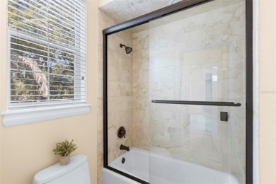 Welcome to this exquisite former model home custom built by on Bayou Golf Club in Florida - for sale on GolfHomes.com, golf home, golf lot