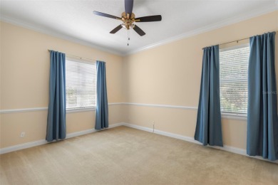 Welcome to this exquisite former model home custom built by on Bayou Golf Club in Florida - for sale on GolfHomes.com, golf home, golf lot
