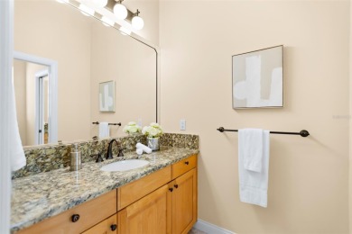 Welcome to this exquisite former model home custom built by on Bayou Golf Club in Florida - for sale on GolfHomes.com, golf home, golf lot
