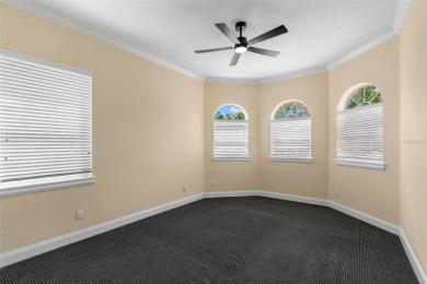Welcome to this exquisite former model home custom built by on Bayou Golf Club in Florida - for sale on GolfHomes.com, golf home, golf lot