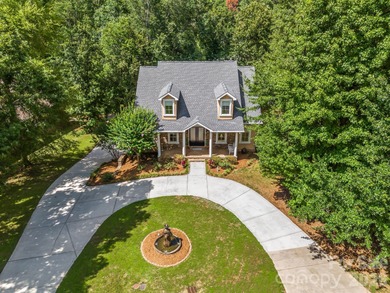 Discover *The Abbey* at Cowans Ford Golf, Tennis & Pickleball on Cowans Ford Country Club in North Carolina - for sale on GolfHomes.com, golf home, golf lot
