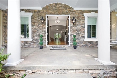 Discover *The Abbey* at Cowans Ford Golf, Tennis & Pickleball on Cowans Ford Country Club in North Carolina - for sale on GolfHomes.com, golf home, golf lot