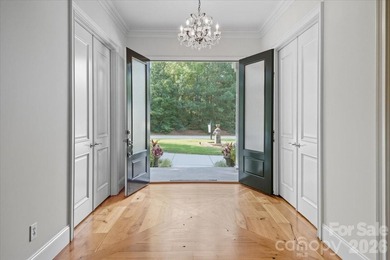 Discover *The Abbey* at Cowans Ford Golf, Tennis & Pickleball on Cowans Ford Country Club in North Carolina - for sale on GolfHomes.com, golf home, golf lot