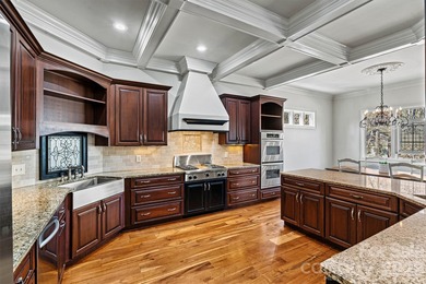 Discover *The Abbey* at Cowans Ford Golf, Tennis & Pickleball on Cowans Ford Country Club in North Carolina - for sale on GolfHomes.com, golf home, golf lot