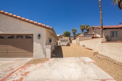 Welcome to your new Lake Havasu retreat! This beautiful on London Bridge Golf Course in Arizona - for sale on GolfHomes.com, golf home, golf lot