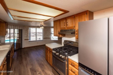 Welcome to your new Lake Havasu retreat! This beautiful on London Bridge Golf Course in Arizona - for sale on GolfHomes.com, golf home, golf lot