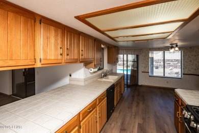 Welcome to your new Lake Havasu retreat! This beautiful on London Bridge Golf Course in Arizona - for sale on GolfHomes.com, golf home, golf lot