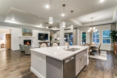 Step into refined luxury with this exquisite one-story residence on The Tribute At the Colony in Texas - for sale on GolfHomes.com, golf home, golf lot