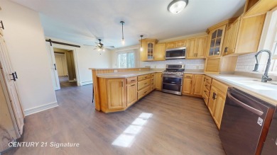 Welcome to 7229 S Lake Bluff! This newly revamped home is on Terrace Bluff Golf Course in Michigan - for sale on GolfHomes.com, golf home, golf lot