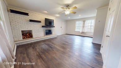 Welcome to 7229 S Lake Bluff! This newly revamped home is on Terrace Bluff Golf Course in Michigan - for sale on GolfHomes.com, golf home, golf lot