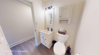 Welcome to 7229 S Lake Bluff! This newly revamped home is on Terrace Bluff Golf Course in Michigan - for sale on GolfHomes.com, golf home, golf lot
