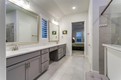 Step into refined luxury with this exquisite one-story residence on The Tribute At the Colony in Texas - for sale on GolfHomes.com, golf home, golf lot