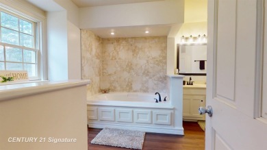 Welcome to 7229 S Lake Bluff! This newly revamped home is on Terrace Bluff Golf Course in Michigan - for sale on GolfHomes.com, golf home, golf lot