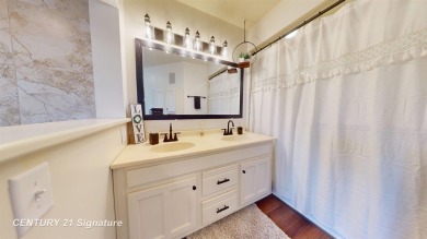 Welcome to 7229 S Lake Bluff! This newly revamped home is on Terrace Bluff Golf Course in Michigan - for sale on GolfHomes.com, golf home, golf lot